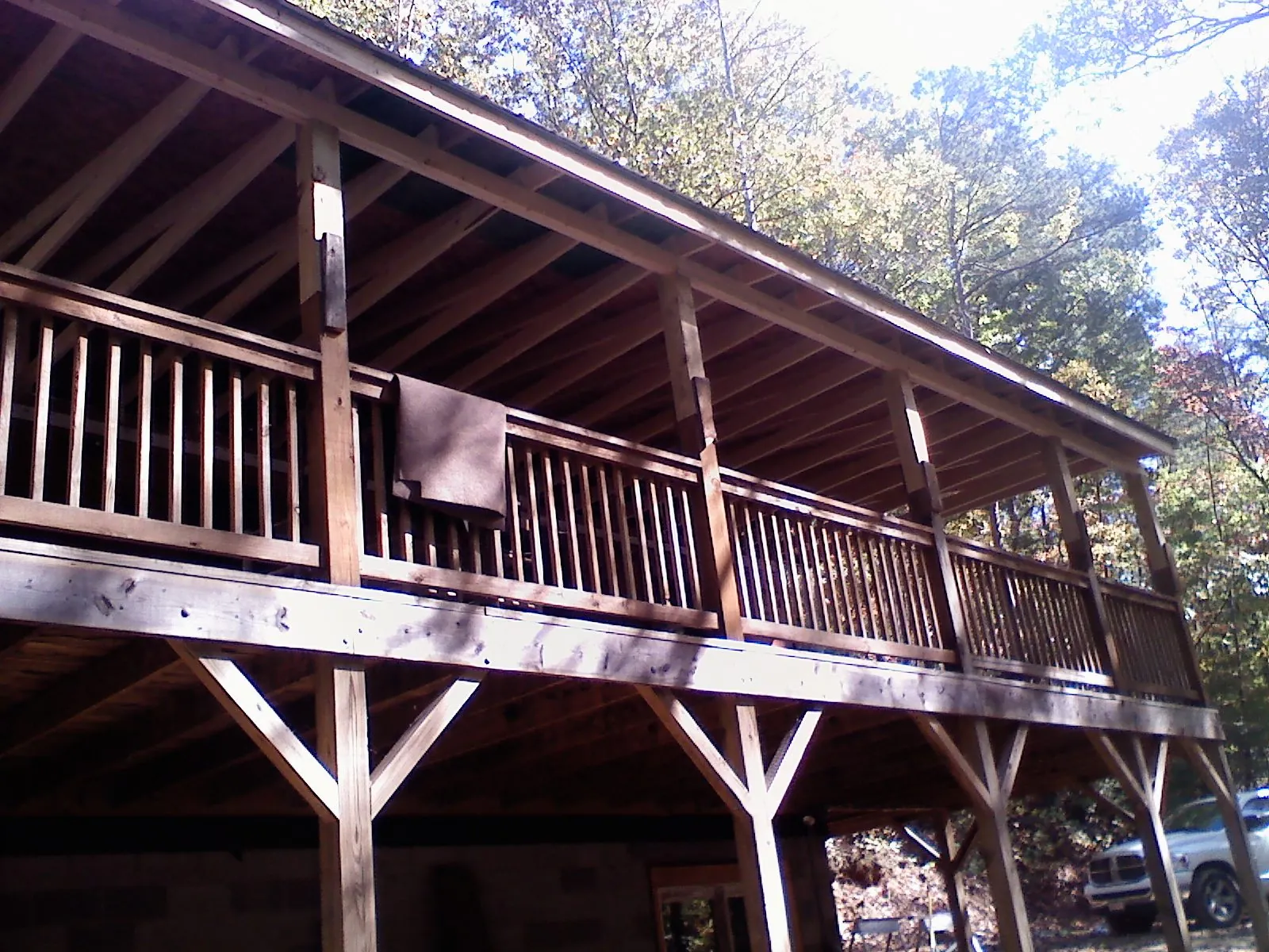 Timber framing under a new elevated porch and deck — Roof Leak Repair in East Berne by Roofing Brothers